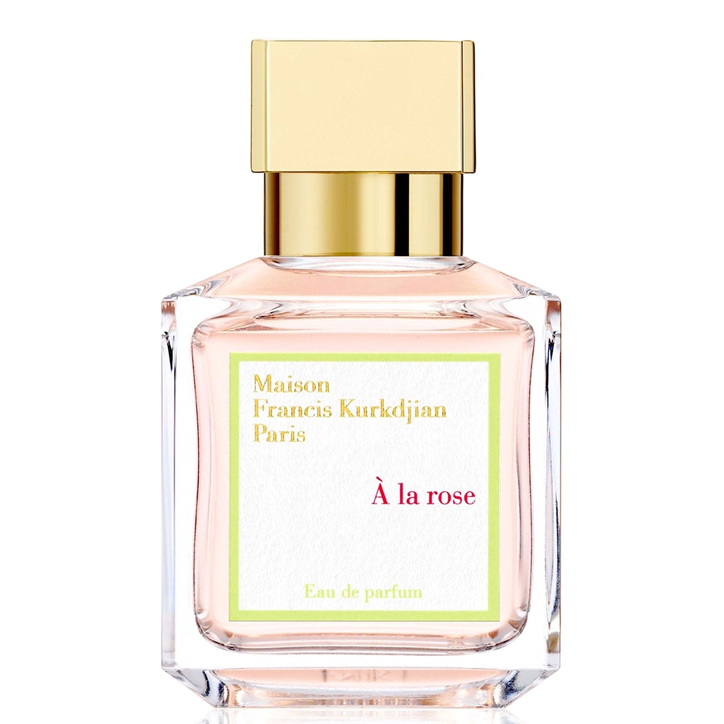 A glass perfume bottle with a gold cap, labeled À la rose by Maison Francis Kurkdjian.