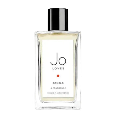 A bottle of Jo Loves Pomelo fragrance with a clear, simple design and a black cap.