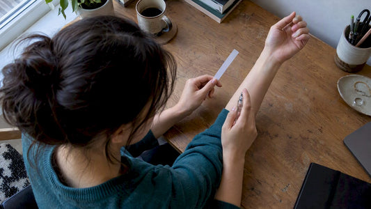 Fragrance tested on a blotter and wrist