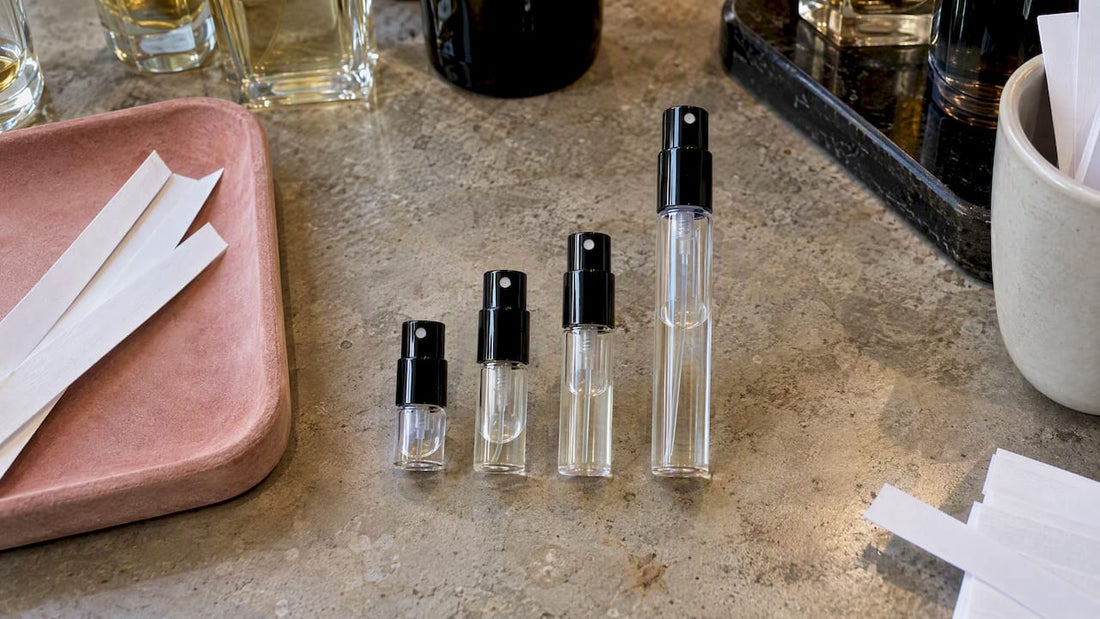 Four fragrance samples in different sizes