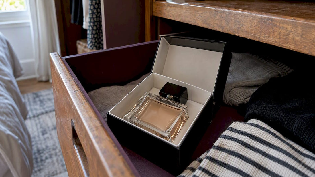 Perfume bottle protected inside its original box