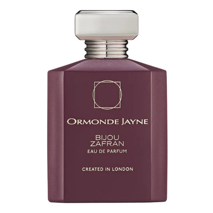 Ormonde Jayne Bijou Zafran Eau de Parfum bottle in a deep plum purple color with a silver metallic cap, shown on a white background with a soft reflection.