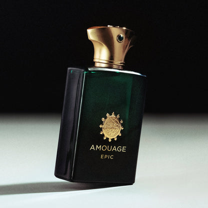 Amouage Epic perfume bottle with gold cap on a dark background