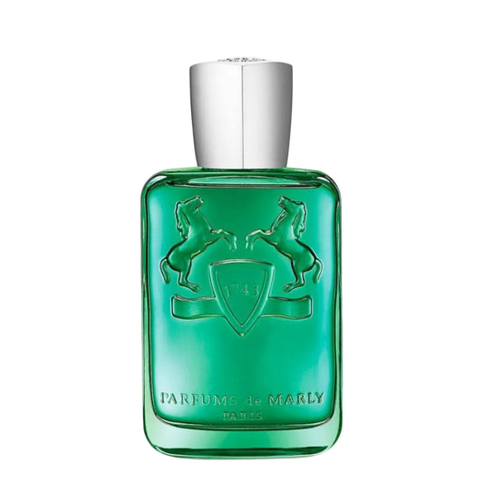 Green perfume bottle with silver cap on a white background