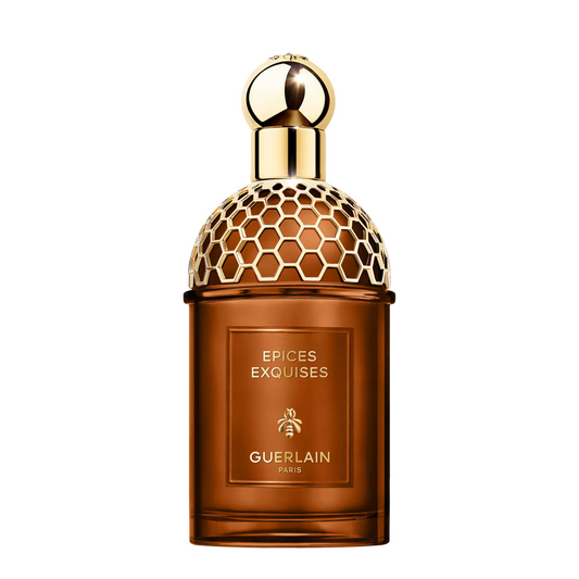 Guerlain perfume bottle with intricate design on a white background