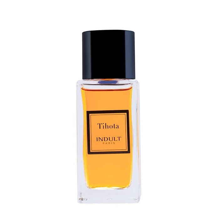 A rectangular glass perfume bottle filled with amber-colored liquid, featuring a black cap and a central black-bordered label that reads 'Tihota INDULIT PARIS'.