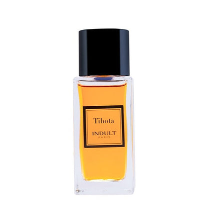 A rectangular glass perfume bottle filled with amber-colored liquid, featuring a black cap and a central black-bordered label that reads 'Tihota INDULIT PARIS'.