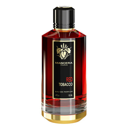 A bottle of Mancera Paris Red Tobacco Eau de Parfum, featuring a clear glass bottle filled with deep red liquid, a black label with gold accents, and a black cap with gold trim, set against a plain white background.