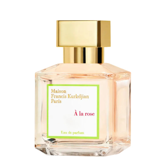 Perfume bottle with gold cap and clear glass body featuring Maison Francis Kurkdjian branding.