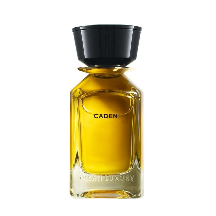 Perfume bottle labeled 'Caden' on a white background