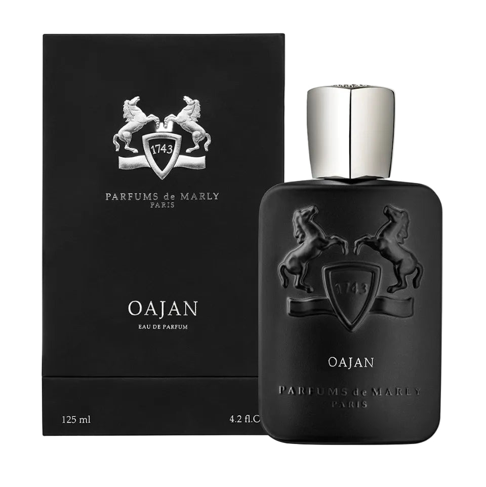 Black Oajan perfume bottle with silver cap on a white background