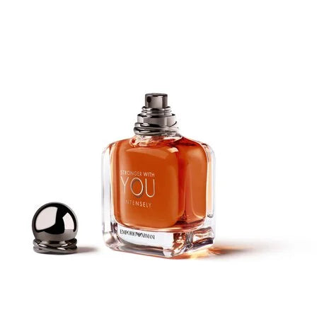 Perfume bottle labeled 'Daringly with You Intensely' on a white background