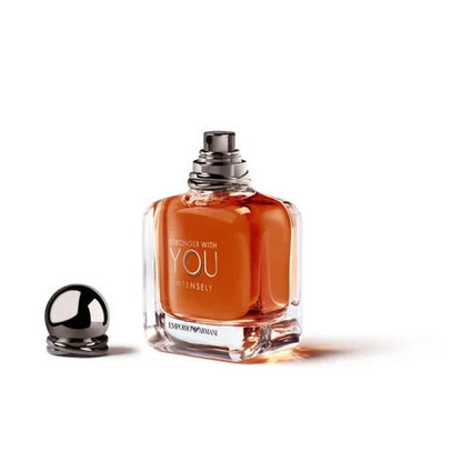 Perfume bottle labeled 'Daringly with You Intensely' on a white background