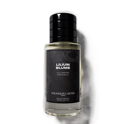 A 100ml bottle of Thomson Caffer Lilium Blume Eau de Parfum on a clean white background with a soft shadow.