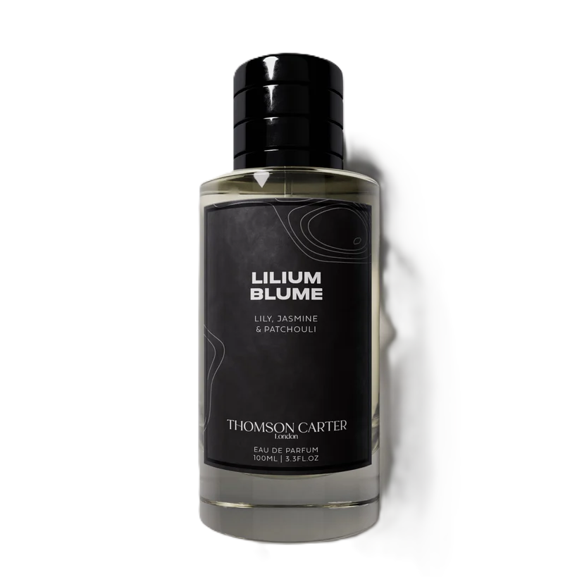 A bottle of Lilium Blume Eau de Parfum by Thomson Carter London, featuring a black cap and a black label with white text, set against a plain white background.