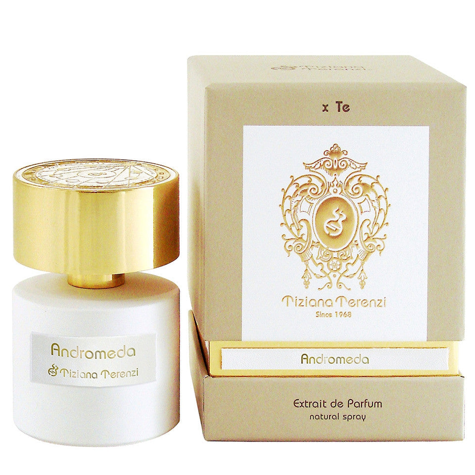 Perfume bottle and packaging with gold accents on a white background