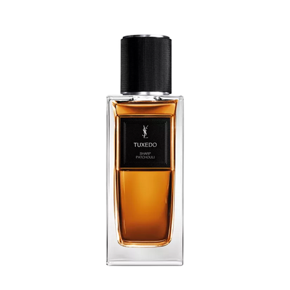 Perfume bottle labeled 'Tuxedo' by Yves Saint Laurent on a white background