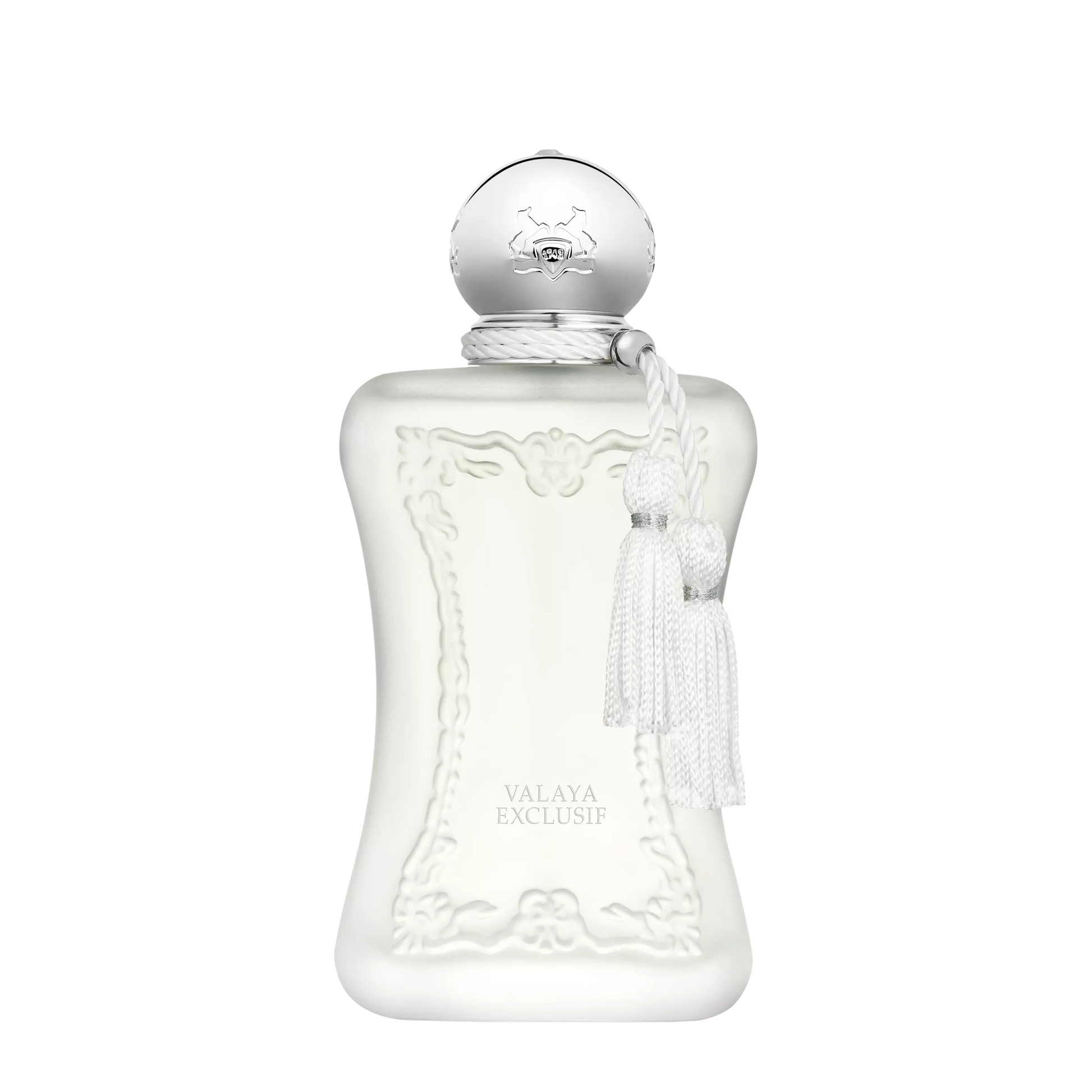 A frosted glass perfume bottle with a silver spherical cap and white tassel, labeled Valaya Exclusif, on a plain white background.
