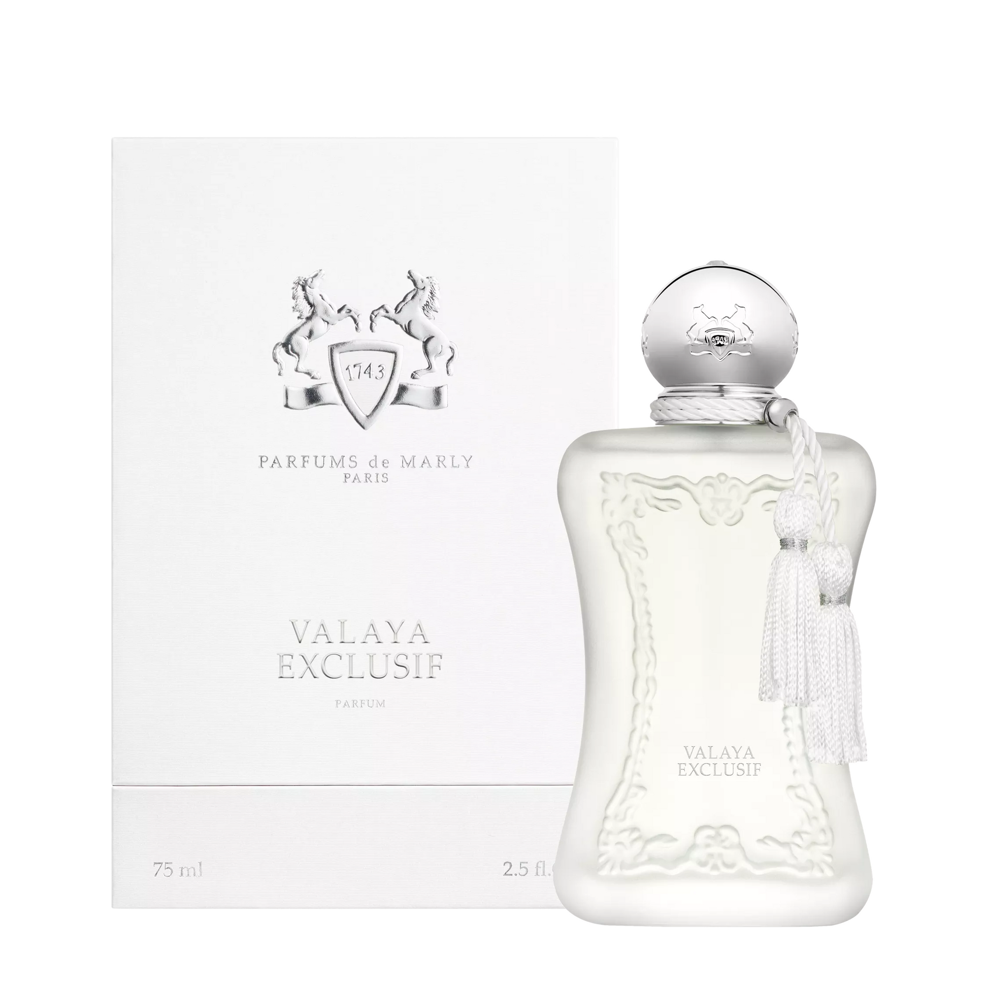 Valaya Exclusif Eau de Parfum bottle with a silver cap and white tassel, displayed next to its white packaging box by Parfums de Marly.
